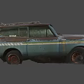 Old Rusty Blue Vintage SUV Car With Roof Rack And Worn Exterior