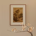Framed Landscape Painting on Beige Wall with Mountain River Scenery and Beige Flower Branches
