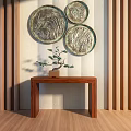 Natural Wooden Console Table With Small Bonsai Plant And Circular Decorative Plates On Striped Wall