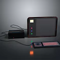 Modern Desktop Computer with Flat Screen Monitor Orange Accented Tower and Illuminated Keyboard