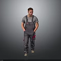 Male Worker In Gray Overalls With Red Pockets Standing On Gray Background