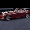 Red Modern Luxury Car With Sleek Exterior Design And Shiny Alloy Wheels