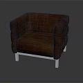 Stylish Brown Upholstered Chair With Padded Armrests And Metal Frame