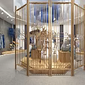 Modern Clothing Store Interior Featuring Golden Metal Frame And Blue Decor Clothing Displays