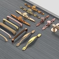 Various Style Decorative Furniture Handles with Intricate Designs and Metallic Colors