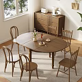 Cozy Wooden Dining Chairs Around Round Table in Bright Natural Room with Window Plants