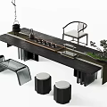 Black Wooden Tea Table and Chairs with Tea Set Stools and Small Plant
