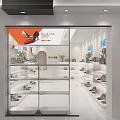 Modern Mall Counter with Shoes and Bags Display in White Design Featuring Green Plants