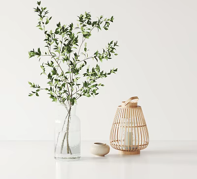 Clear Glass Vase With Green Foliage And Bamboo Lantern On White Tabletop 3d model