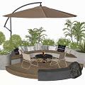 Outdoor Chairs With Fire Pit Under Patio Umbrella On Wooden Deck Surrounded By Green Plants