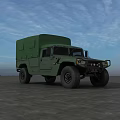 Green Military Truck With Large Tires On Open Ground Under Blue Sky