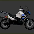 Stylish White And Blue Adventure Motorcycle With Black Windshield And Gray Side Cases