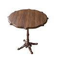 Round Wooden Table With Carved Legs And Clear Wood Grain Classic Design
