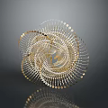 Golden Spiral Decorative Ornament With Rotating Metal Strips And Reflective Base