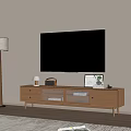 Modern Light Wood TV Stand with Decorative Items Photo Frame in Cozy Living Room