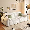 White Two Seater Sofa With Green Throw Pillows And Wall Art In Modern Living Room
