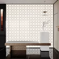 Modern Elegant Front Desk Reception With Perforated Screen Marble Countertop Sculpture Chandelier And Metal Decor