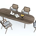 Modern Wooden Oval Dining Table With Six Woven Back Chairs And Gray Cushions