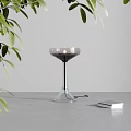 Transparent Glass Table Lamp With Wine Glass Inspired Smoky Gray Shade And Green Leaves