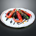 Red Cooked Shrimp on Black Pasta with Sauce and Garnish on White Plate