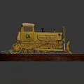 Vintage Bulldozer Model Displayed On Circular Wooden Base With Dirt Gravel And Fern Plant
