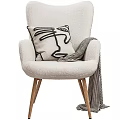 Modern Leisure Chair With Plush Fabric Wooden Legs Abstract Pillow And Striped Throw Blanket