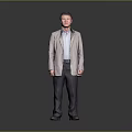 Standing Man In Light Coat And Shirt With Dark Pants Against Gray Background