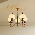 Elegant Classical Chandelier With White Lampshades And Brass Frame On Decorative Ceiling