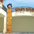 Popular Photo Spot With Giant Cartoon Head Golden Column And Floral Wreaths