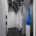 Modern Public Restroom With Blue Stall Doors Black Gender Symbols And White Walls