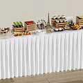 Assorted Desserts Fruits and Cakes on White Tablecloth Long Table with Eiffel Tower Model