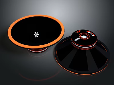 Modern Black And Orange Circular Electronic Speakers With Stylish Design 3d model