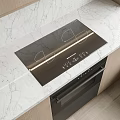 Modern Kitchen Interior With Marble Countertop Black Induction Cooktop And Oven Appliances