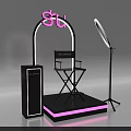Pink Shu Themed Photo Check-in Spot Featuring Ring Light Director Chair And Black Platform