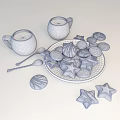 Festive Decorated Cookies With White Icing On A Plate And Hot Tea In White Cups