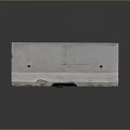Gray Concrete Curb With Two Holes And Damaged Bottom On Reflective Surface