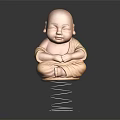 Little Monk Statue In Yellow Robe Sitting Cross Legged On Spring Base