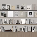 Books and Magazines Neatly Arranged on Wooden Bookshelves with Various Covers and Decorative Items