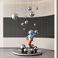 Modern Interior Sculpture Featuring Cartoon Character Blue Top Orange Pants And Silver Spheres