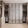 Modern Beige Walk In Wardrobe With Frosted Sliding Glass Doors And Large Clothing Storage System