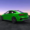 Green Audi Sports Car With Sleek Exterior And Black Alloy Wheels Against Sunset Sky
