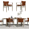 Modern Leather Dining Table Set With Metal Legs And Tabletop Decorative Items