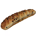 Freshly Baked Long Loaf Bread With Dark Raisins And Golden Crust