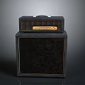Black Guitar Amplifier With Two Section Design Control Panel And Speaker Cabinet
