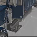 Blue Peterbilt Semi Truck With Chrome Details Dual Exhaust Pipes On Reflective Surface