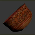 Red Carved Bowl Sculpture With Intricate Surface Texture And Smooth Curved Edges