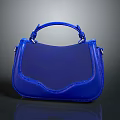 Stylish Modern Blue Handbag With Top Handle Curved Front Detail And Glossy Design