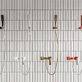 Modern Shower Faucets in Multiple Colors Mounted on Grid Pattern Wall Design 3d model