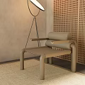 Modern Beige Leather Leisure Chair With Floor Lamp Rattan Rug And Perforated Wall