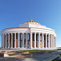 Circular School Building With Golden Dome And White Columns Surrounded By Lawn And Trees